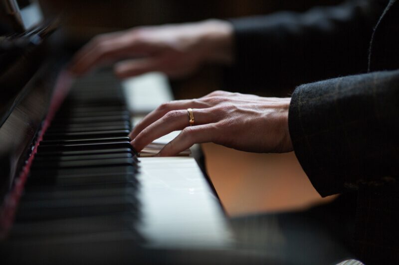 Pianist's hands on the keys